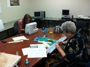 student and teacher working on a project